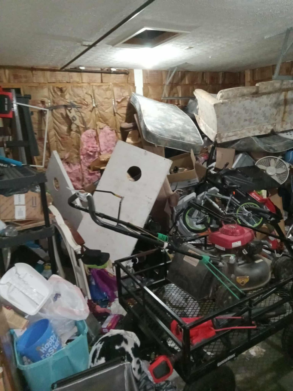Packed garage before a residential cleanout in Northern Kentucky